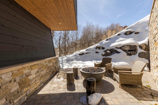2848 W Deer Pointe Dr, Park City, UT 84060 - snow covered patio with a fire pit