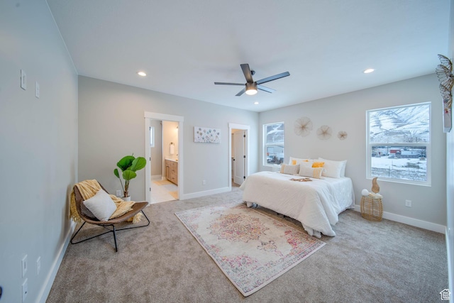 1436 E Parker Ln Unit 426, Lake Point, UT 84074 - bedroom with ensuite bathroom, baseboards, recessed lighting, and light colored carpet
