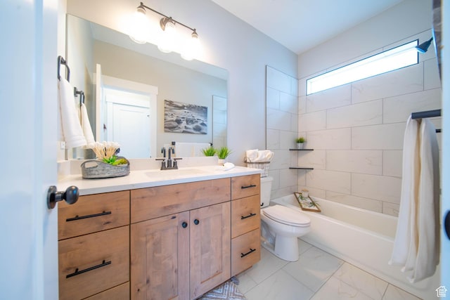 1436 E Parker Ln Unit 426, Lake Point, UT 84074 - bathroom featuring shower / bathing tub combination, vanity, marble finish floor, and toilet