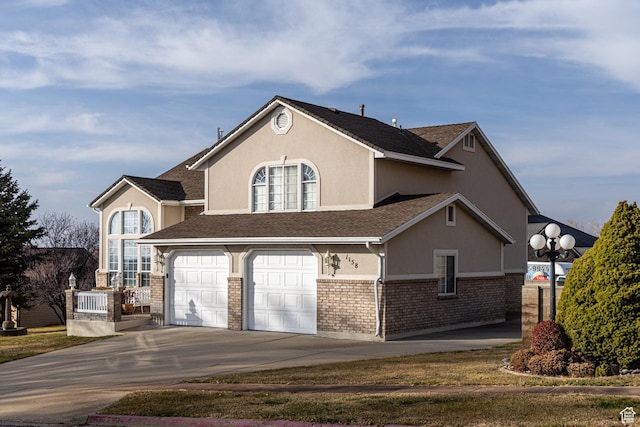 view of front of property with a garage