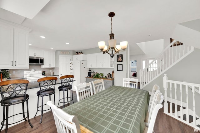 538 E 1200 S, Kaysville, UT 84037 - dining space with a notable chandelier and dark hardwood / wood-style floors