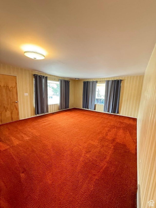 spare room featuring carpet flooring