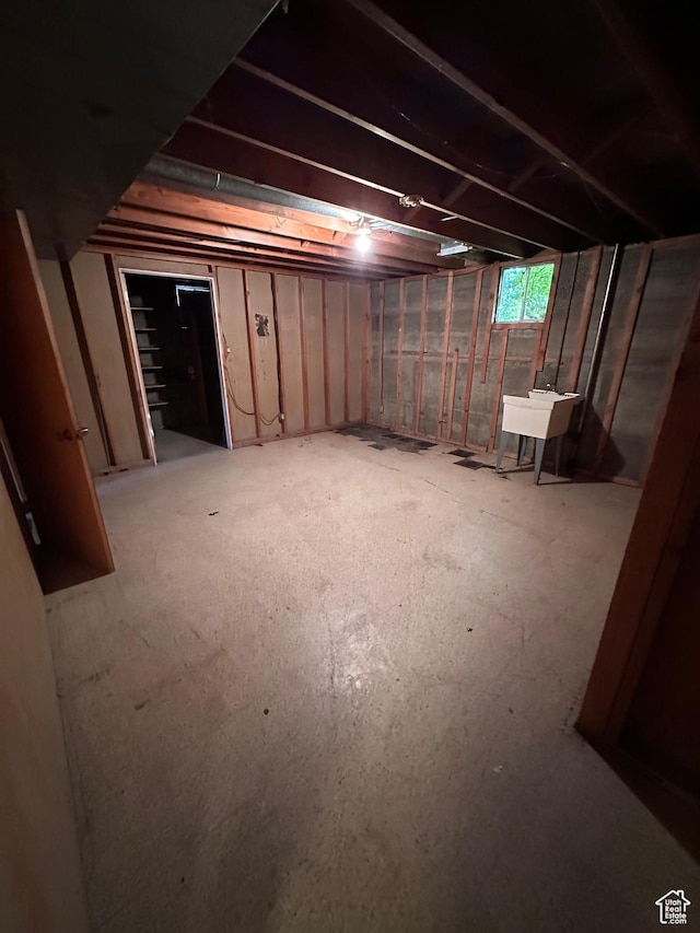 basement with a sink