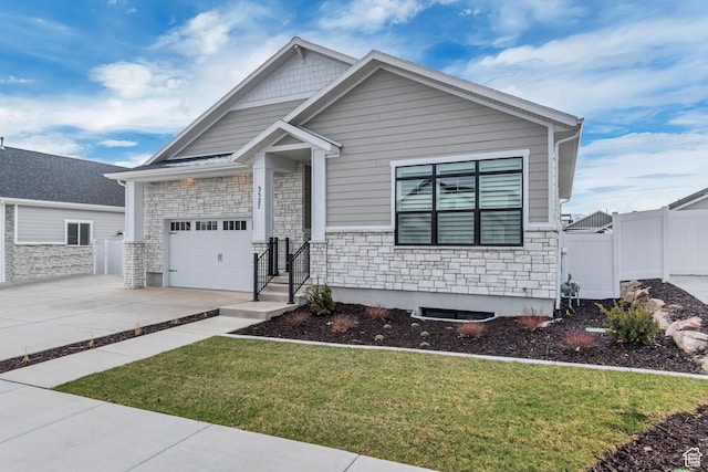 3527 W Haven Aire, South Jordan, UT 84095 - craftsman inspired home featuring concrete driveway, stone siding, a gate, a front yard, and an attached garage