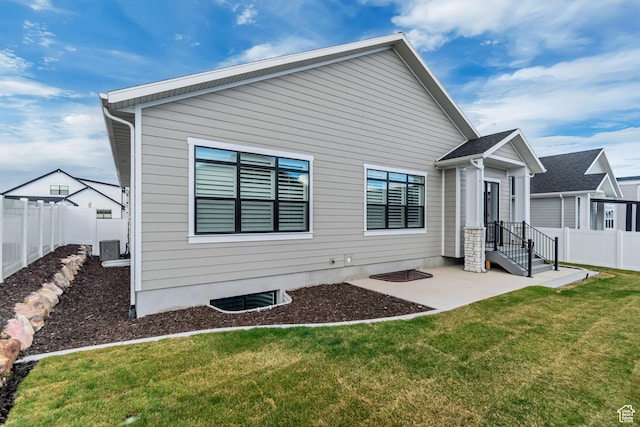 3527 W Haven Aire, South Jordan, UT 84095 - back of house featuring a yard, a patio, central AC, and a fenced backyard