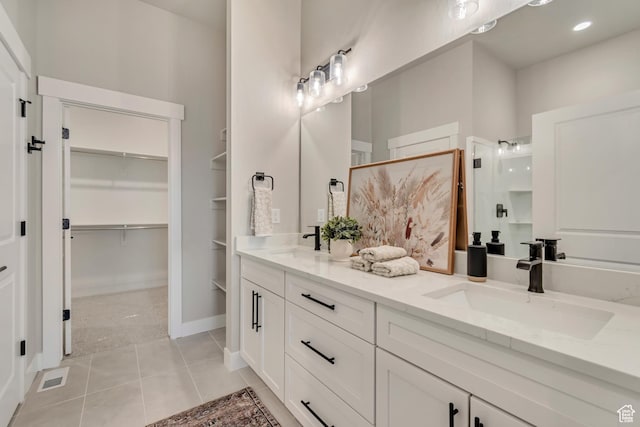 3527 W Haven Aire, South Jordan, UT 84095 - bathroom with double vanity, a sink, a walk in shower, and visible vents