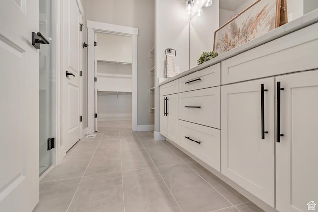 3527 W Haven Aire, South Jordan, UT 84095 - full bath featuring baseboards, a spacious closet, tile patterned flooring, and vanity
