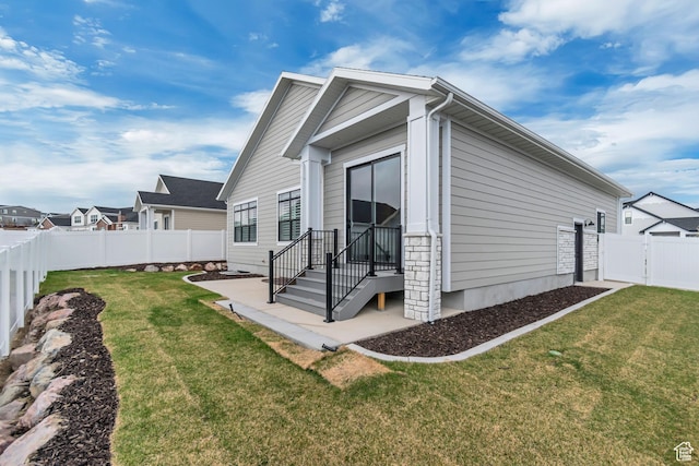 3527 W Haven Aire, South Jordan, UT 84095 - view of property exterior featuring a yard, a fenced backyard, and a patio area
