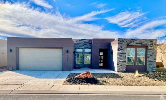 3260 Retreat Dr S, Hurricane, UT 84737 - contemporary home featuring a garage