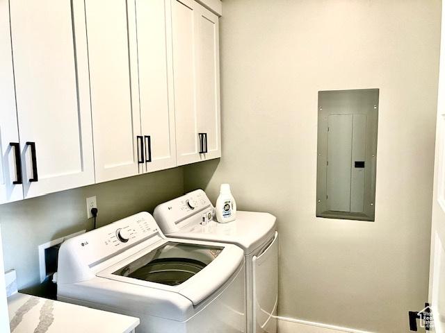 3260 Retreat Dr S, Hurricane, UT 84737 - clothes washing area with cabinets, electric panel, and washer and clothes dryer