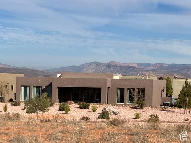 3260 Retreat Dr S, Hurricane, UT 84737 - rear view of house featuring a mountain view