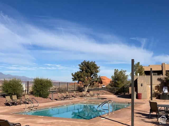 3260 Retreat Dr S, Hurricane, UT 84737 - view of pool featuring a patio area and a mountain view