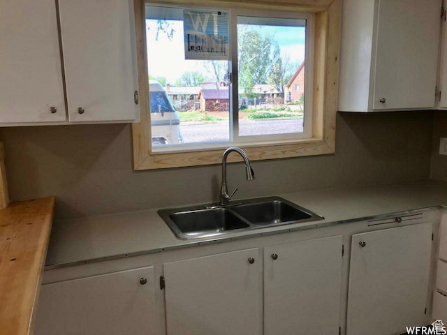 250 W 700 S, Richfield, UT 84701 - kitchen with sink and white cabinetry