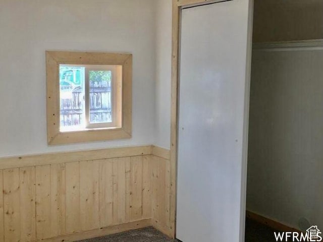 250 W 700 S, Richfield, UT 84701 - interior space with carpet flooring and wooden walls