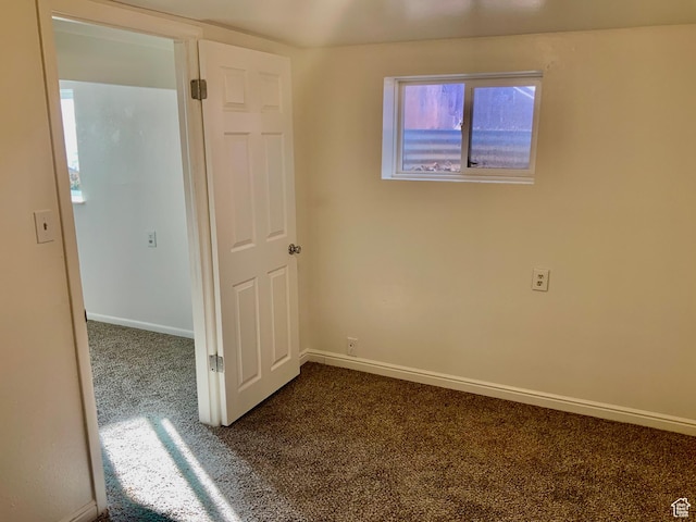 250 W 700 S, Richfield, UT 84701 - empty room with dark colored carpet