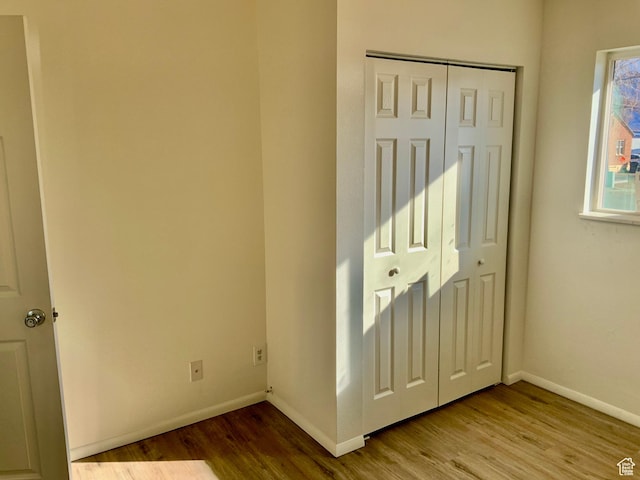 250 W 700 S, Richfield, UT 84701 - unfurnished bedroom with light hardwood / wood-style flooring and a closet