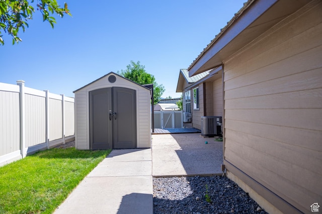 view of outbuilding featuring central AC