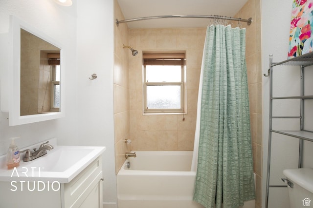 full bathroom with shower / bath combo, vanity, and toilet