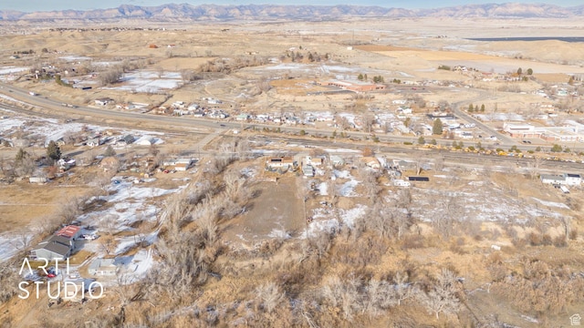 bird's eye view with a mountain view