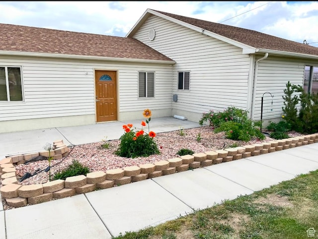 view of front of house featuring a patio