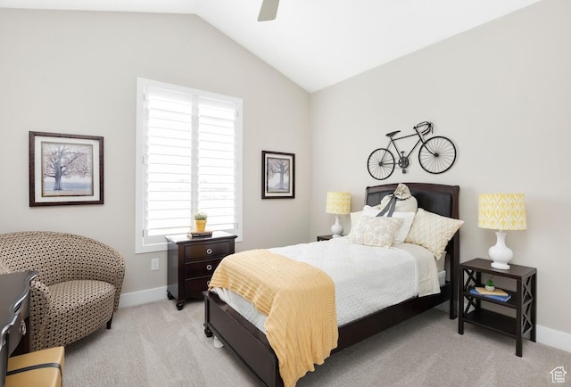 carpeted bedroom featuring ceiling fan and lofted ceiling