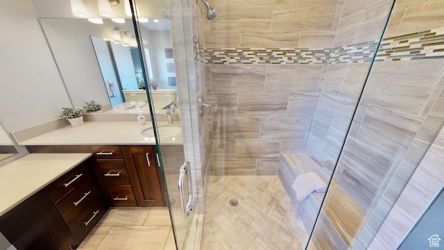 668 W 0470 N, Moab, UT 84532 - bathroom with tile patterned flooring, vanity, and walk in shower