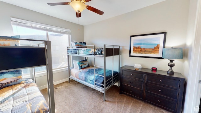 668 W 0470 N, Moab, UT 84532 - bedroom featuring ceiling fan and light carpet