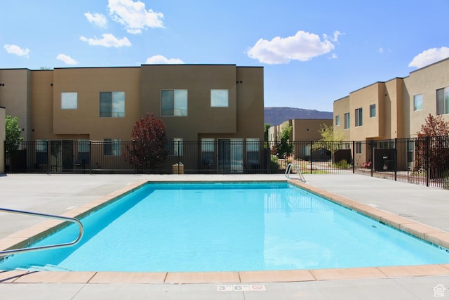668 W 0470 N, Moab, UT 84532 - view of swimming pool featuring a mountain view and a patio