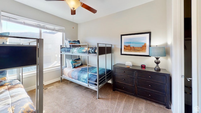 668 W 0470 N, Moab, UT 84532 - bedroom featuring ceiling fan and light colored carpet