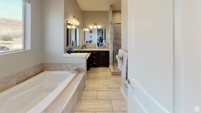 668 W 0470 N, Moab, UT 84532 - bathroom featuring shower with separate bathtub and vanity