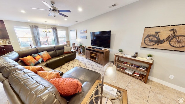 668 W 0470 N, Moab, UT 84532 - living room with ceiling fan with notable chandelier, light tile patterned flooring, and lofted ceiling