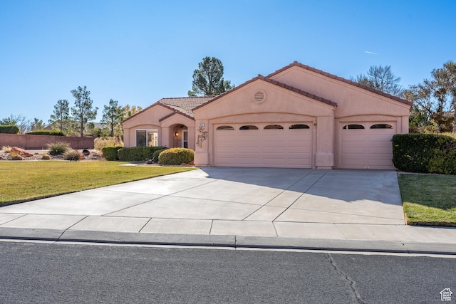 2461 W 1050 N, Hurricane, UT 84737 - view of front facade with a front yard and a garage