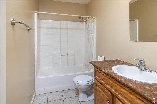 full bathroom with tile patterned floors, vanity, shower / bath combination with curtain, and toilet