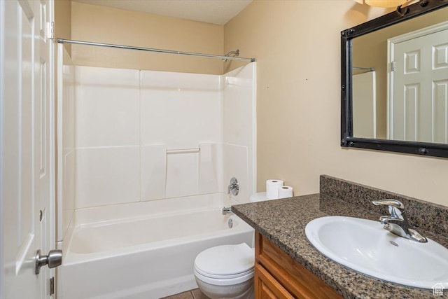 full bathroom with vanity, toilet, and shower / washtub combination