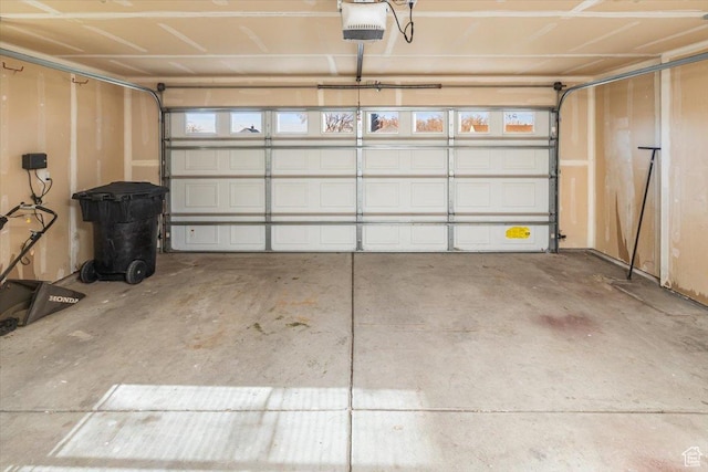 garage featuring a garage door opener