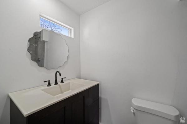 756 E 3rd St S, Ogden, UT 84404 - half bathroom featuring toilet and vanity