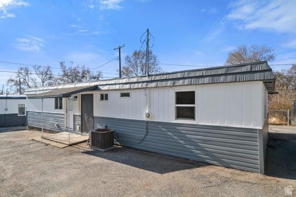 756 E 3rd St S, Ogden, UT 84404 - view of front of house with cooling unit and driveway