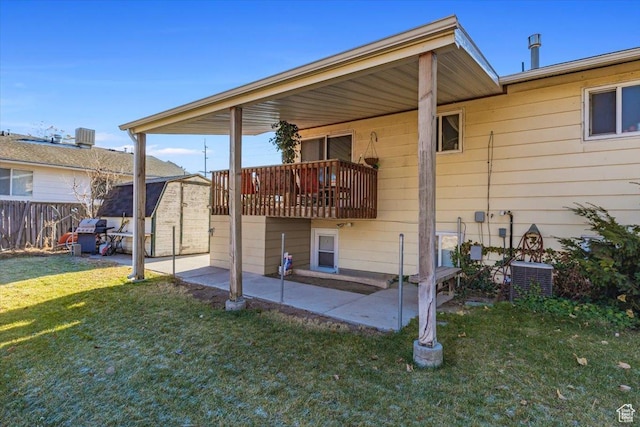 exterior space with a yard, central AC, and a patio area