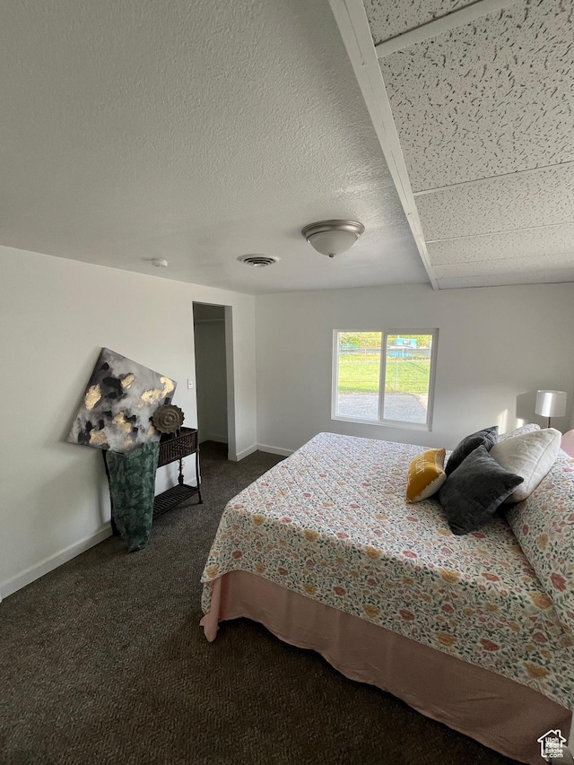 758 E 3rd St S, Ogden, UT 84404 - bedroom with dark carpet and baseboards
