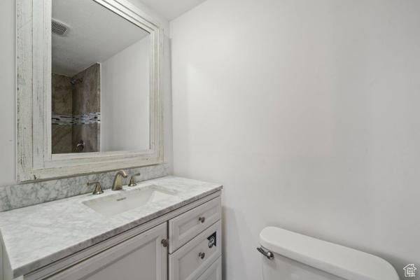 758 E 3rd St S, Ogden, UT 84404 - bathroom featuring toilet and vanity