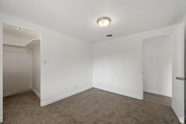 758 E 3rd St S, Ogden, UT 84404 - unfurnished bedroom featuring carpet flooring, a closet, and baseboards