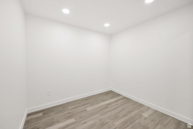 unfurnished room featuring light hardwood / wood-style flooring