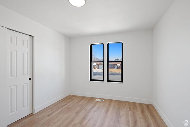 12875 S Aspen Cir, Riverton, UT 84065 - spare room with light wood finished floors and baseboards