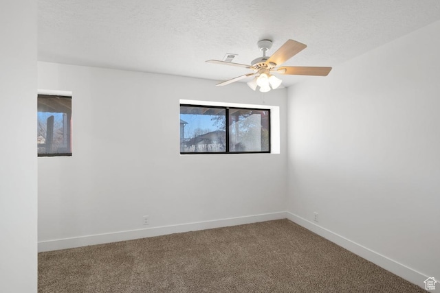 12875 S Aspen Cir, Riverton, UT 84065 - spare room with carpet flooring, a textured ceiling, and ceiling fan