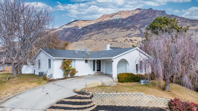 single story home with a mountain view