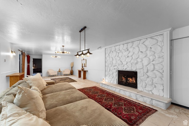 837 E 930 N, Pleasant Grove, UT 84062 - living room featuring a stone fireplace and a chandelier