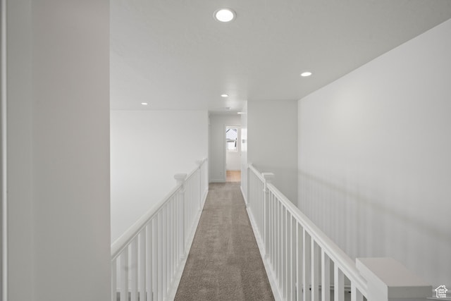 hall with carpet floors