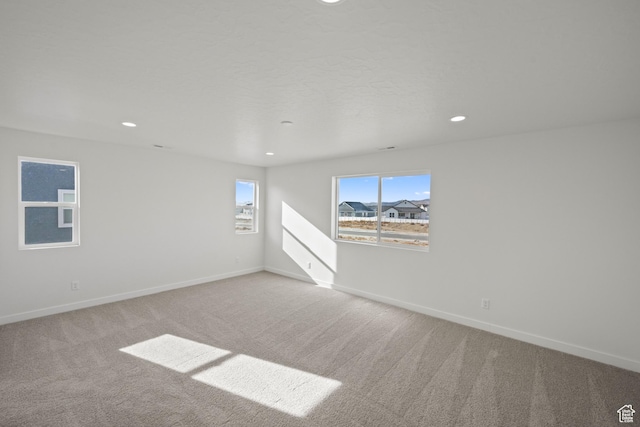 view of carpeted spare room