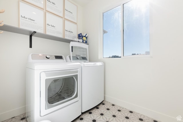 470 Lotus Dr Unit 149, Fish Haven, ID 83287 - clothes washing area featuring washer and clothes dryer and baseboards