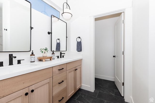 470 Lotus Dr Unit 149, Fish Haven, ID 83287 - bathroom featuring double vanity and baseboards